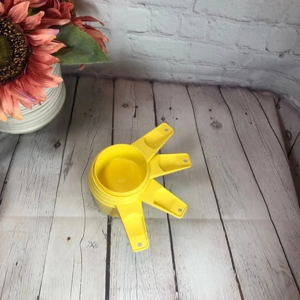 Vintage Tupperware measuring cup set yellow - not full set